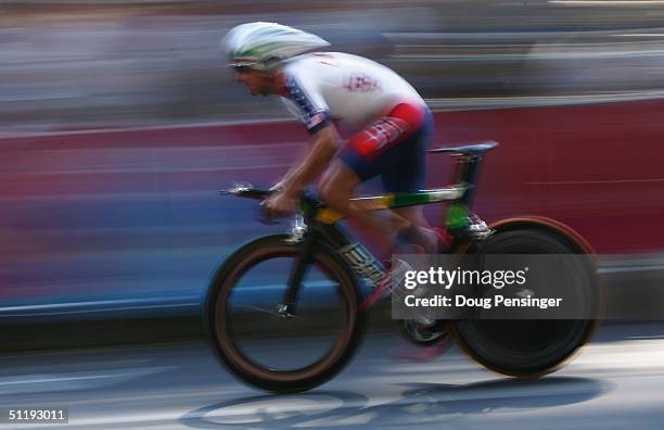 Tyler Hamilton of the USA rides in the men's road cycling individual time trial on August 18, 2004 during the Athens 2004 Summer Olympic Games at the...