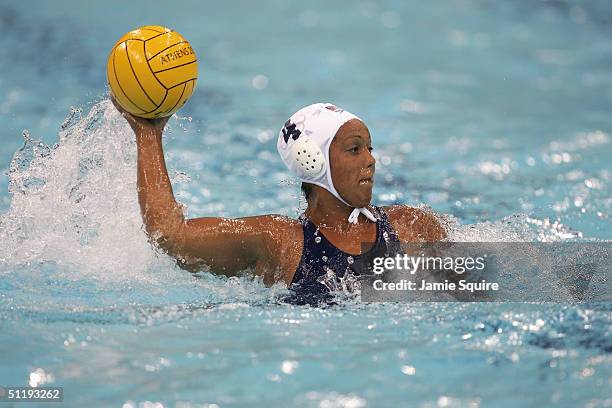 Brenda Villa of the USA looks to shoot in the women's Water Polo preliminary game against Hungary on August 16, 2004 during the Athens 2004 Summer...