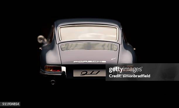 classic porsche 911 model rear view - porsche carrera stock pictures, royalty-free photos & images