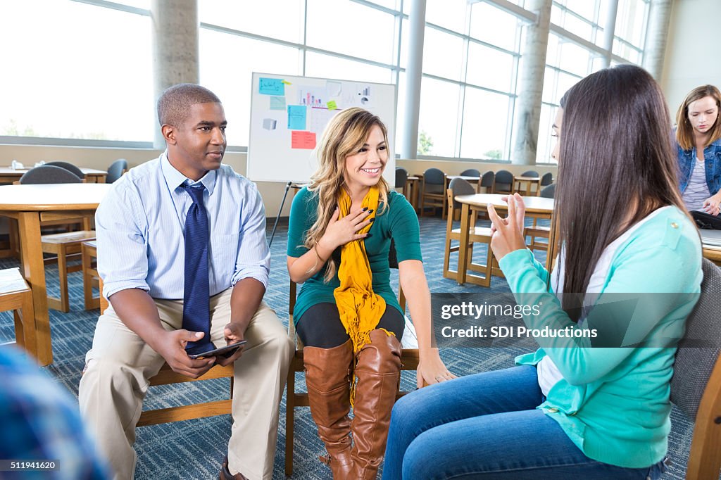 Support group meeting in college library