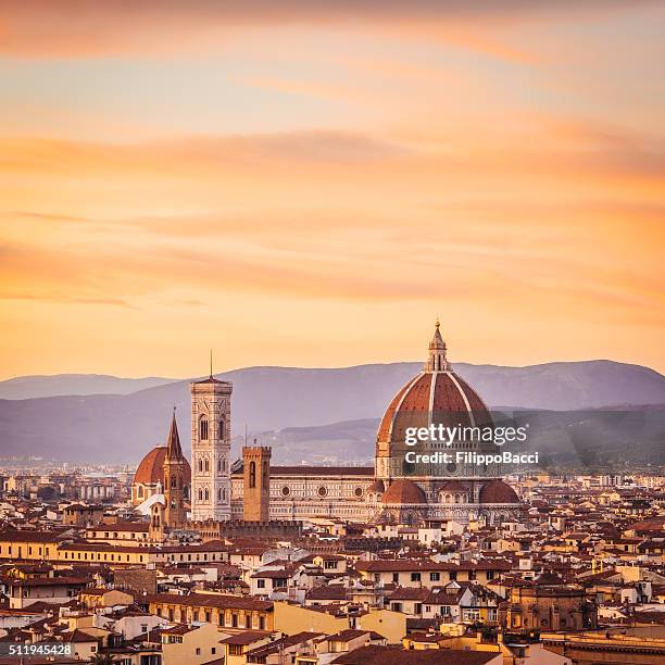florence's cathedral and skyline at sunset - florence italy stock pictures, royalty-free photos & images