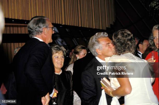 Bob Hawke Prime Minister of Australia kisses Tannie Fraser in 1988 in Sydney, Australia.