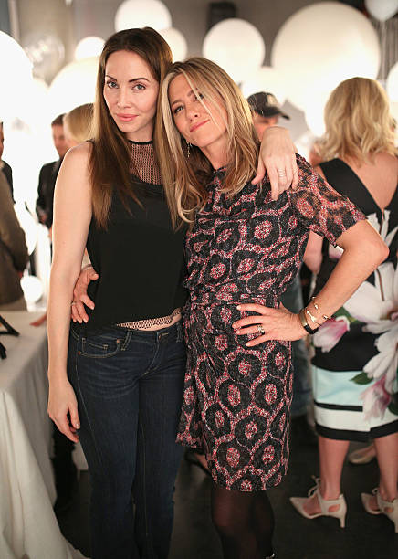 Comedian Whitney Cummings and actress Jennifer Aniston attends smartwater sparkling celebrates Jennifer Aniston and St Jude's Children's Hospital at...