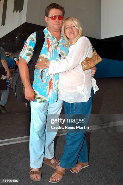 Peter Phelps and pregnant partner Donna Fowkes on the second day of the Melbourne International Music and Blues Festival at the Melbourne exhibition...