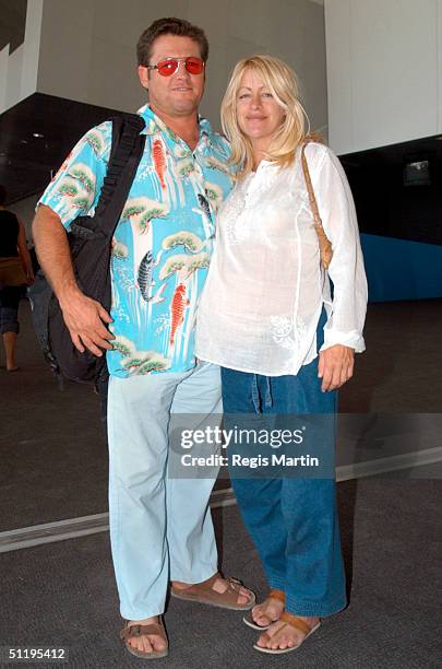 Peter Phelps and pregnant partner Donna Fowkes on the second day of the Melbourne International Music and Blues Festival at the Melbourne exhibition...