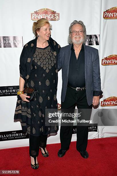 Actor Russ Tamblyn and wife Bonnie Murray Tamblyn attend the premiere of "The Illusionists - Live From Broadway" at the Pantages Theatre on February...