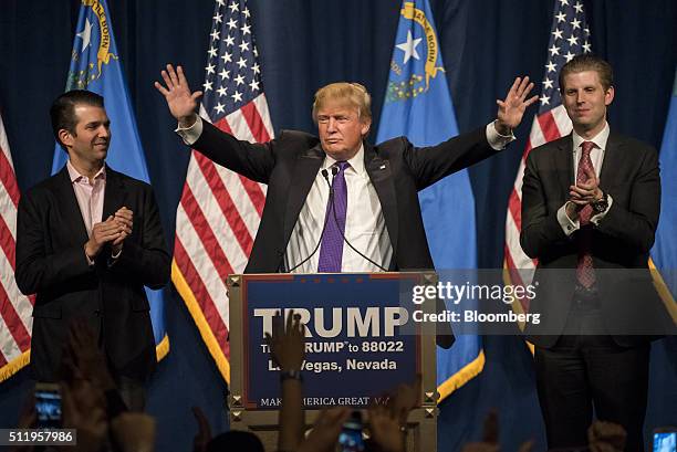 Donald Trump, president and chief executive of Trump Organization Inc. And 2016 Republican presidential candidate, center, gestures as his sons...