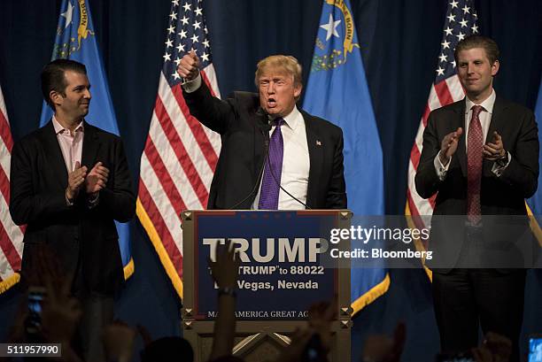 Donald Trump, president and chief executive of Trump Organization Inc. And 2016 Republican presidential candidate, center, speaks as his sons Donald...