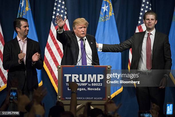 Donald Trump, president and chief executive of Trump Organization Inc. And 2016 Republican presidential candidate, center, speaks as his sons Donald...