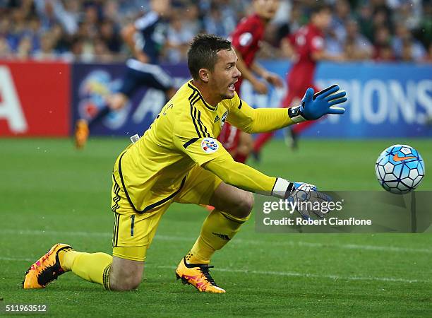 Victory goalkeeper Danny Vukovic throws the ball back into play during the AFC Asian Champions League match between Melbourne Victory and Shanghai...