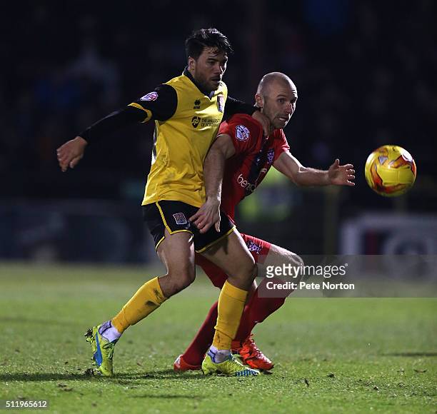 Russell Penn of York City contests the ball with Danny Rose of Northampton Town during the Sky Bet League Two match between York City and Northampton...