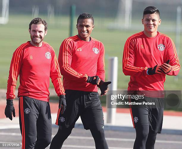 Juan Mata, Marcos Rojo and Antonio Valencia of Manchester United in action during a first team training session at Aon Training Complex on February...