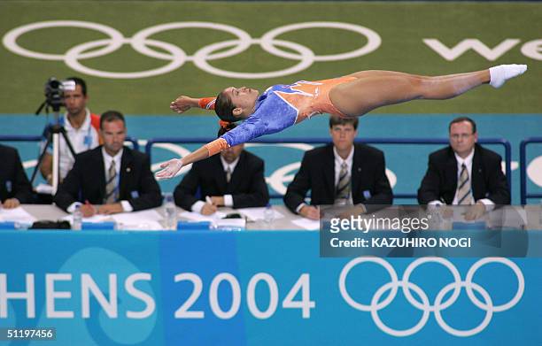 Andrea Lenders of the Netherlands performs in the air during the women's trampoline final, 20 August 2004, at the Olympic Indoor Hall during the...