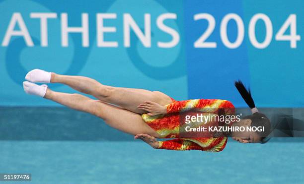Huang Shanshan of China performs at the women's trampoline final, 20 August 2004, at the Olympic Indoor Hall during the Athens 2004 Olympics Games....