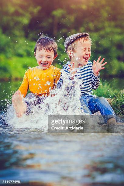 children outdoors - spring fun stock pictures, royalty-free photos & images