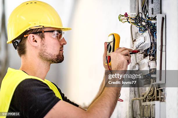 industrial electric panel repair - electric stockfoto's en -beelden