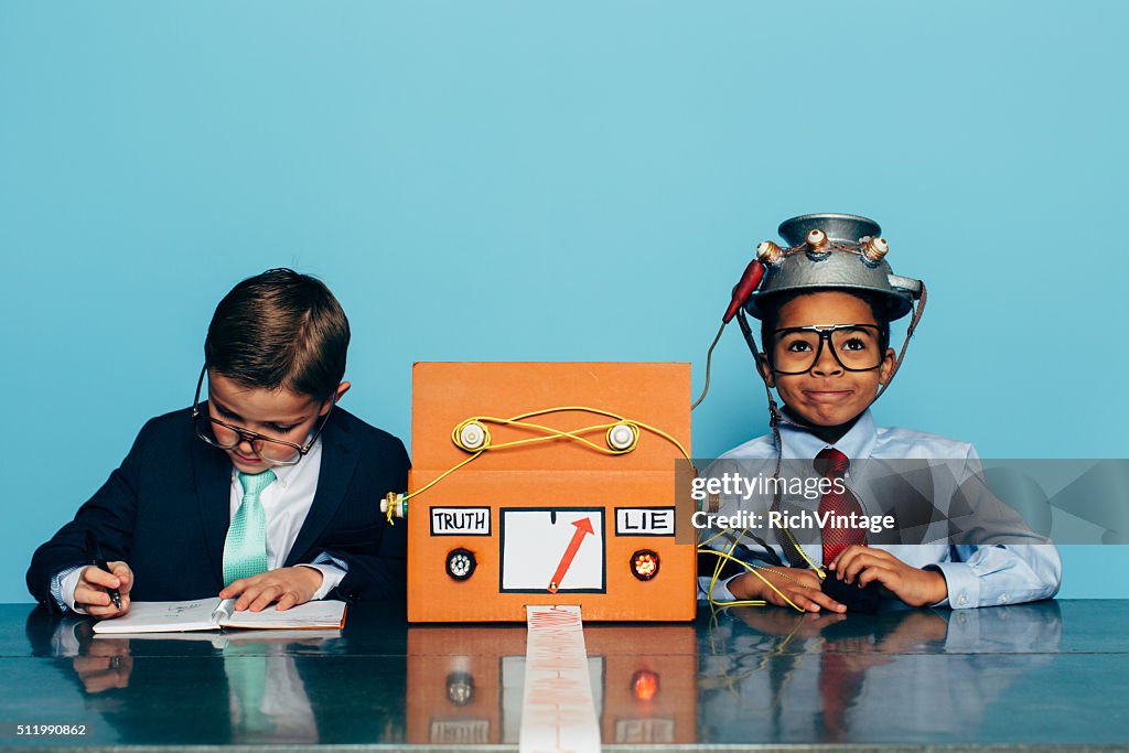 Two Young Businessman with Lie Detector