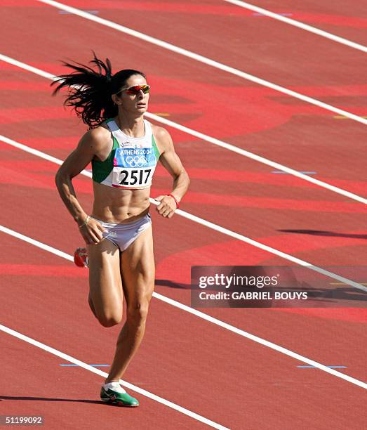 World 400m champion Ana Guevara of Mexico competes in heat one, round one of the women's 400m race, 21 August 2004, during the Olympic Games...