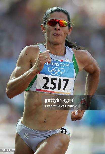 Ana Guevara of Mexico competes in the women's 400 metre event on August 21, 2004 during the Athens 2004 Summer Olympic Games at the Olympic Stadium...