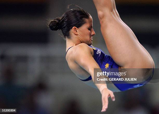Australian women diver Loudy Tourky competes in the women's 10m platform semi-final, 21 August 2004, in the 2004 Olympic Games in Athens. AFP PHOTO...
