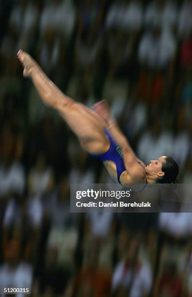 Loudy Tourkey of Australia competes in the women's diving 10 metre platform semifinal on August 21, 2004 during the Athens 2004 Summer Olympic Games...