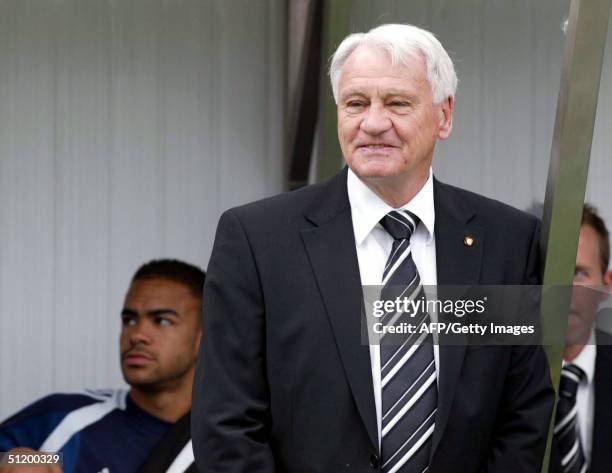 Newcastle manager Bobby Robson is pictured next to Newcastle midfielder Kieron Dyer prior to the match Newcastle United vs Tottenham Hotspur at St....