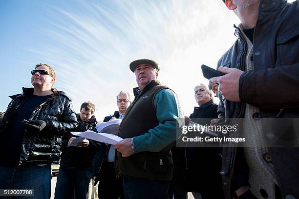 Trainer Paul Nicholls talks with journalists during a media open day at his stables on February 24, 2016 in Ditcheat, England.