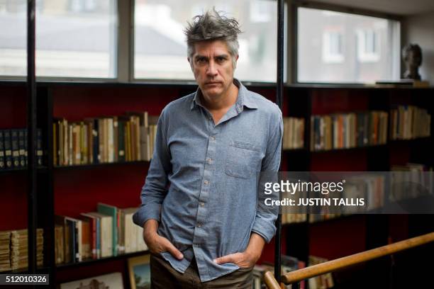 Chilean architect Alejandro Aravena poses for a portrait in London on February 23, 2016. / TO GO WITH AFP STORY BY ALFONS LUNA