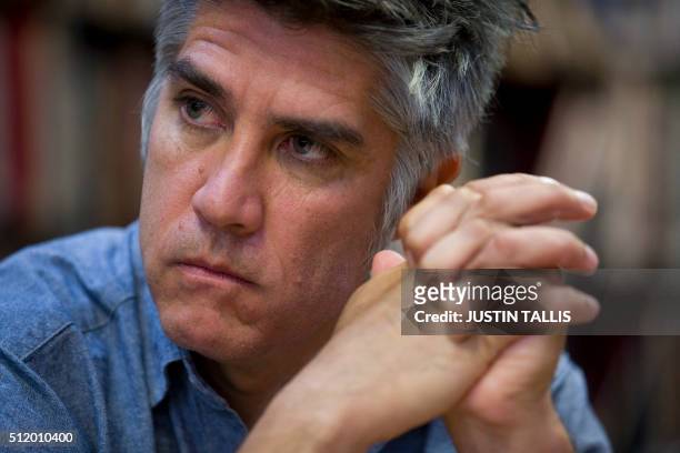 Chilean architect Alejandro Aravena gives an interview to AFP in London on February 23, 2016. / TO GO WITH AFP STORY BY ALFONS LUNA