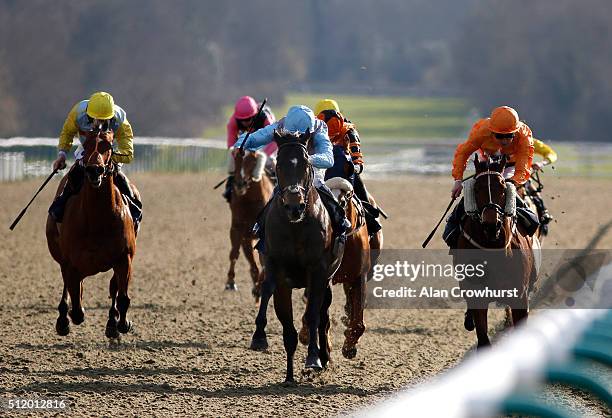 Shane Kelly riding Believe It win The Ladbrokes Handicap Stakes at Lingfield racecourse on February 24, 2016 in Lingfield, England.