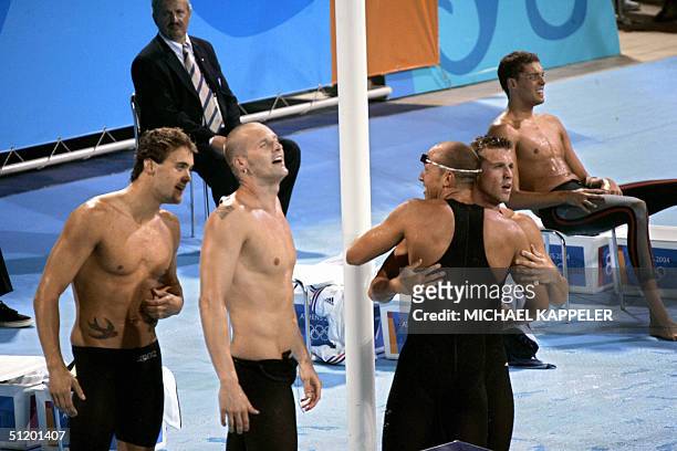 Germany's relay team Steffen Driesen, Jens Kruppa, Thomas Rupprath and Lars Conrad celebrate after winning the men's 4x100m medley relay silver...
