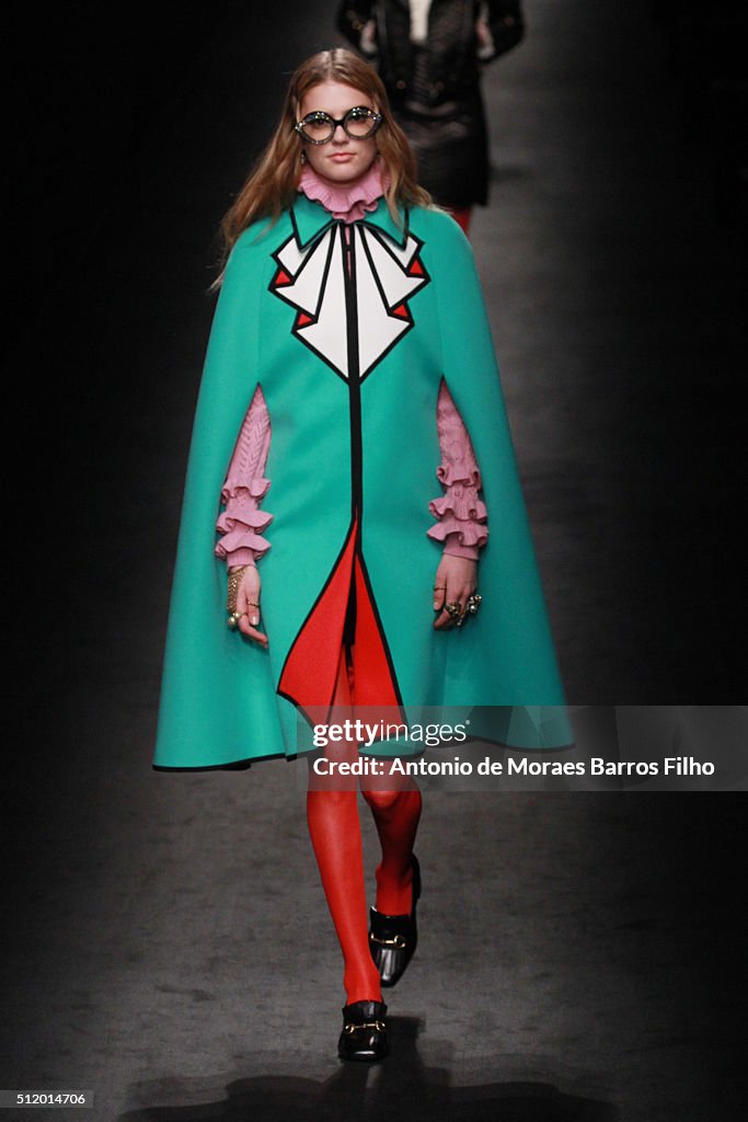 A model walks the runway at the Gucci show during Milan Fashion Week