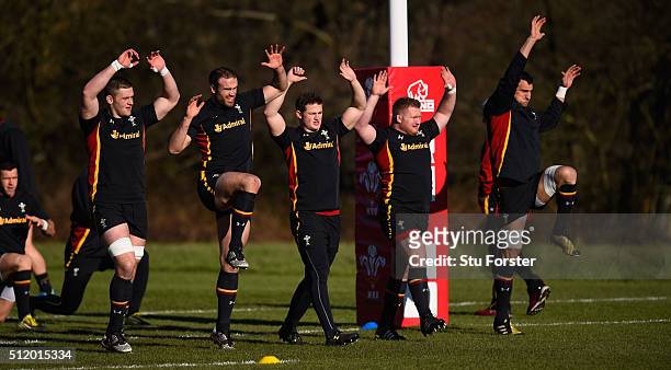Wales players from left to right Dan Lydiate; Jamie Roberts, Hallam Amos, Samson Lee and captain Sam Warburton raise their hands during the warm up...