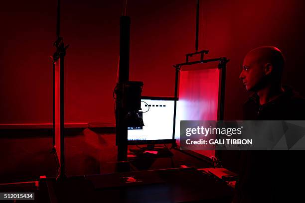 Shai Halevi, the photographer responsible for the image processing of thousands of fragments from the Dead Sea Scrolls, stands next to a unique...