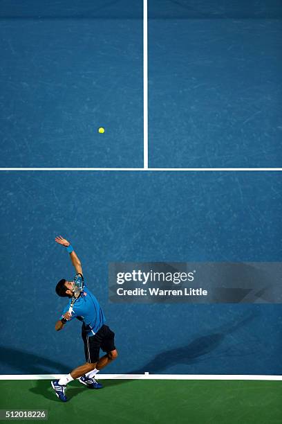 Novak Djokovic of Serbia in action against Malek Jaziri of Tunisia during day five of the ATP Dubai Duty Free Tennis Championship at the Dubai Duty...