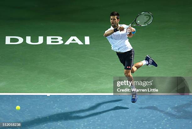 Novak Djokovic of Serbia in action against Malek Jaziri of Tunisia during day five of the ATP Dubai Duty Free Tennis Championship at the Dubai Duty...