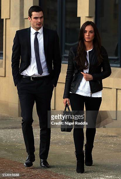 Footballer Adam Johnson leaves with partner Stacey Flounders at Bradford Crown Court for day nine of the trial where he is facing child sexual...