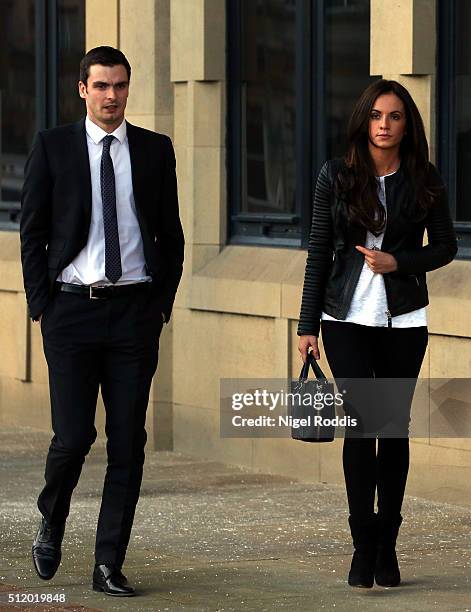 Footballer Adam Johnson leaves with partner Stacey Flounders at Bradford Crown Court for day nine of the trial where he is facing child sexual...