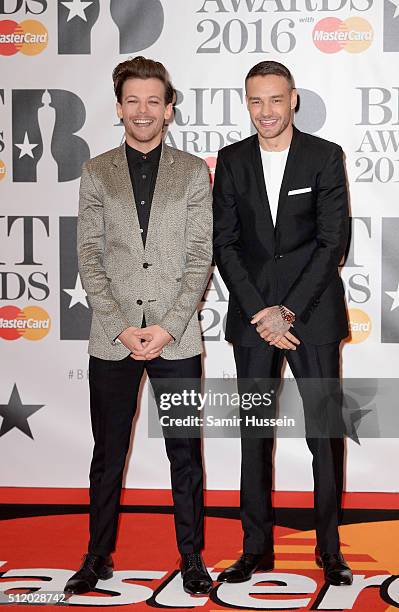 Louis Tomlinson and Liam Payne from One Direction attend the BRIT Awards 2016 at The O2 Arena on February 24, 2016 in London, England.