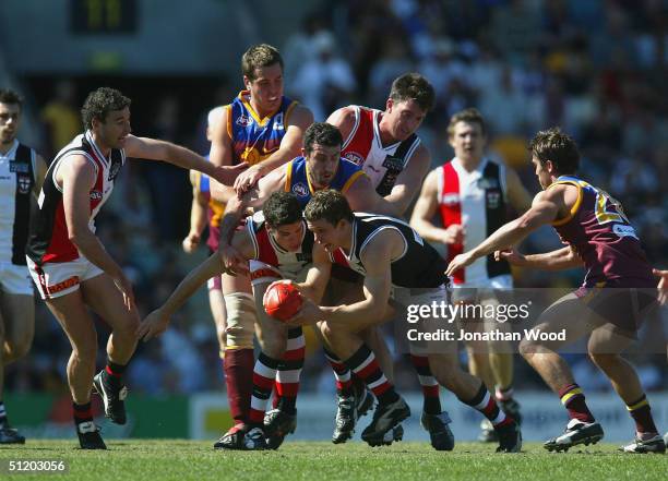 Leigh Montagna and Luke Ball of the Saints contest the ball during the AFL match between the Brisbane Lions and Saint Kilda August 22 at the Gabba,...