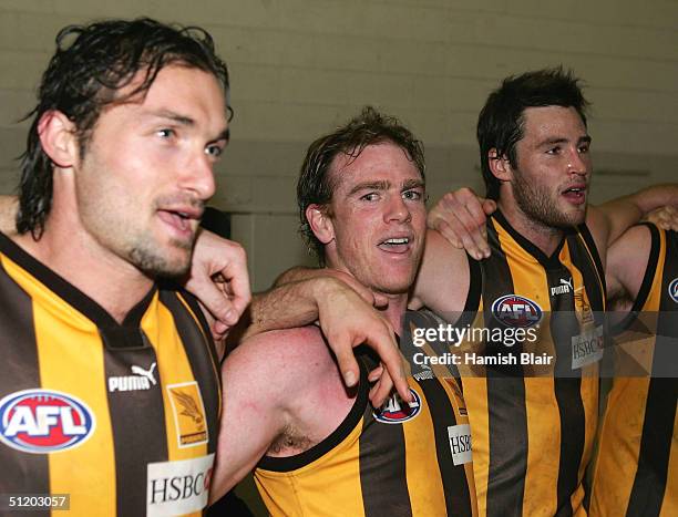 Rayden Tallis for Hawthorn celebrates with team mates in the rooms after his final game the round twenty one AFL match between the Hawthorn Hawks and...