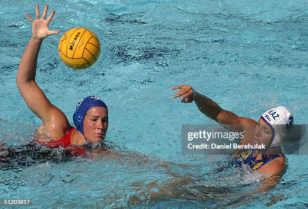 Tatyana Gubina of Kazakhstan throws a pass in the women's Water Polo 7th and 8th place classification game on August 22, 2004 during the Athens 2004...