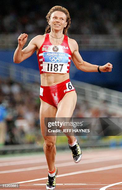 Yuliya Nesterenko of Belarus competes in the women's 100m finals, 21 August 2004, during the Olympic Games athletics competitions at the Olympic...