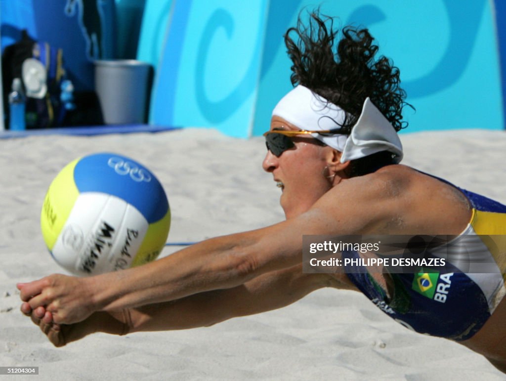 Shelda Brazilian player Shelda Bede returns the ball in the women's beach ...