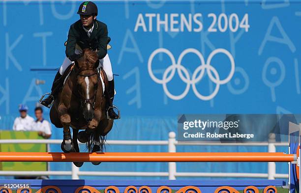 Rodrigo Pessoa of Brazil rides Baloubet du Rouet during the individual show jumping event on August 22, 2004 during the Athens 2004 Summer Olympic...