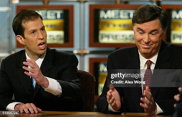 Tad Devine , senior advisor of the Kerry-Edwards campaign, reacts as he debates Ken Mehlman , campaign manager of the Bush-Cheney campaign, on NBC's...