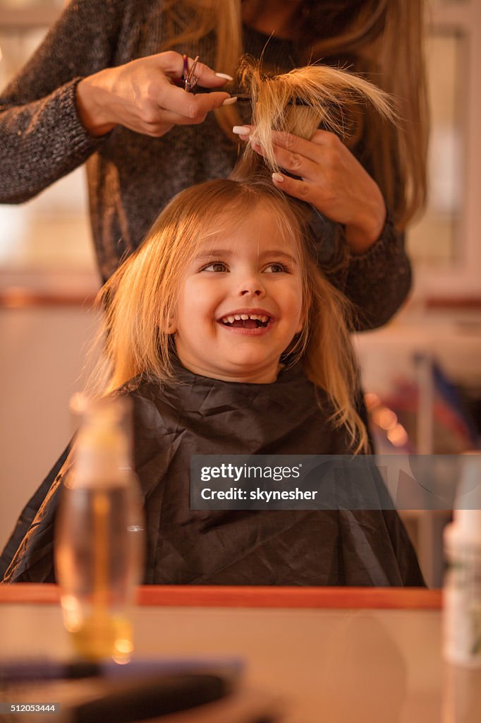 Cute Little Girl During Hair Cut At Hair Salon High-Res Stock Photo - Getty  Images
