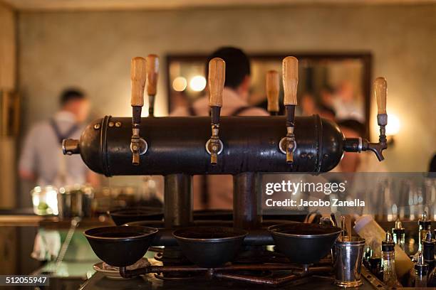 old beer dispenser - beer tap stockfoto's en -beelden