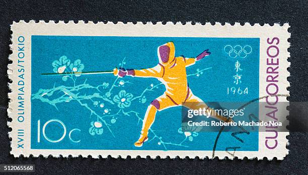 Fencing at the 1964 Olympic Games held at Tokyo. A series of mailing stamps used by the Cuban public depicting sporting events held at the 1964...