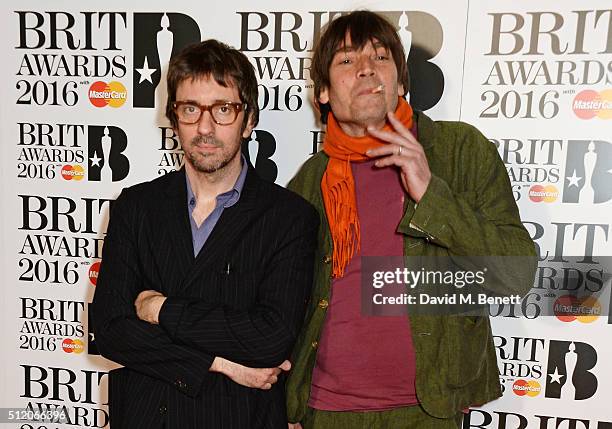 Graham Coxon and Alex James of Blur arrives the BRIT Awards 2016 at The O2 Arena on February 24, 2016 in London, England.